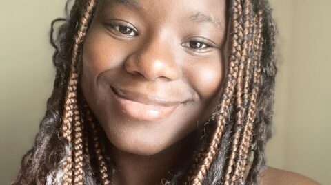 A headshot of Abby, our new Harvest VISTA member.