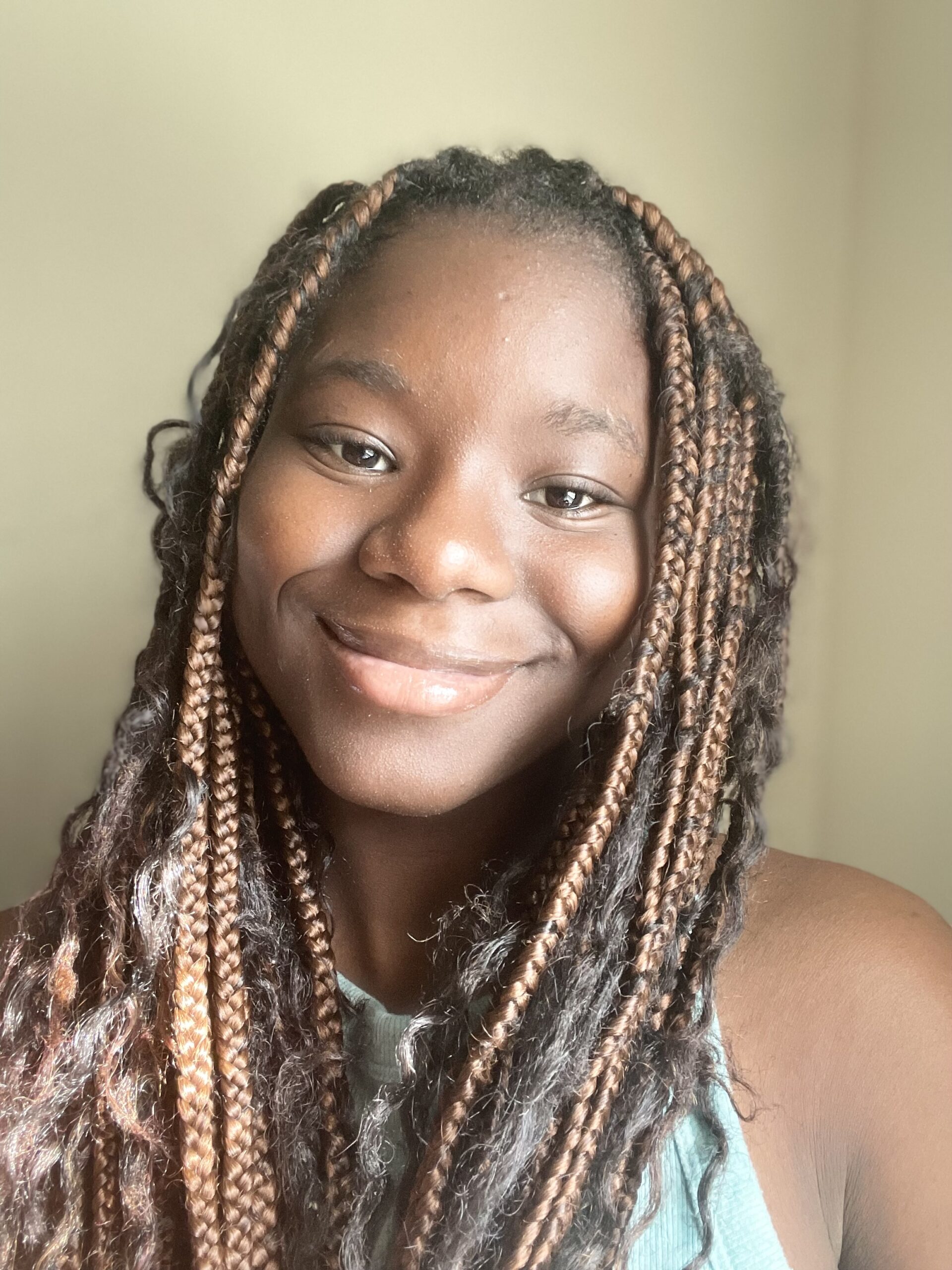 A headshot of Abby, our new Harvest VISTA member.